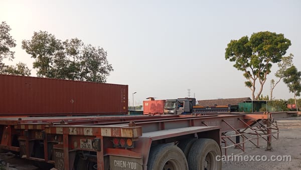 Semi-trailers parked on the concrete at the Nhon Trach yard awaiting dispatch