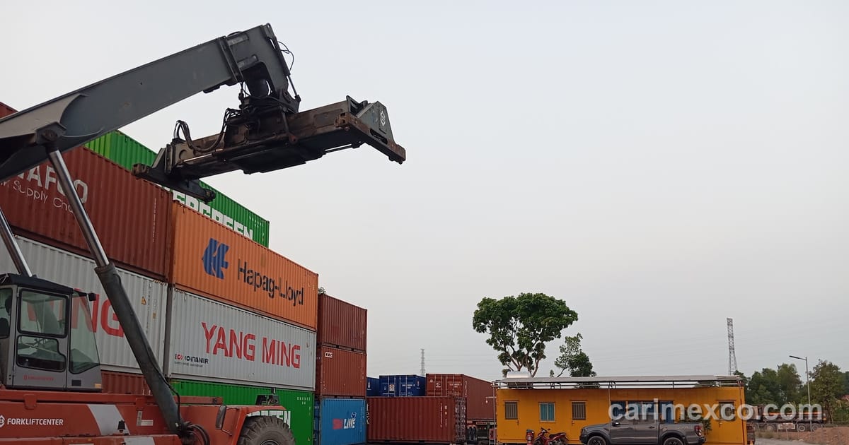 A reach stacker working containers at CARIMEX's 20,000 m² yard in Nhon Trach, Dong Nai